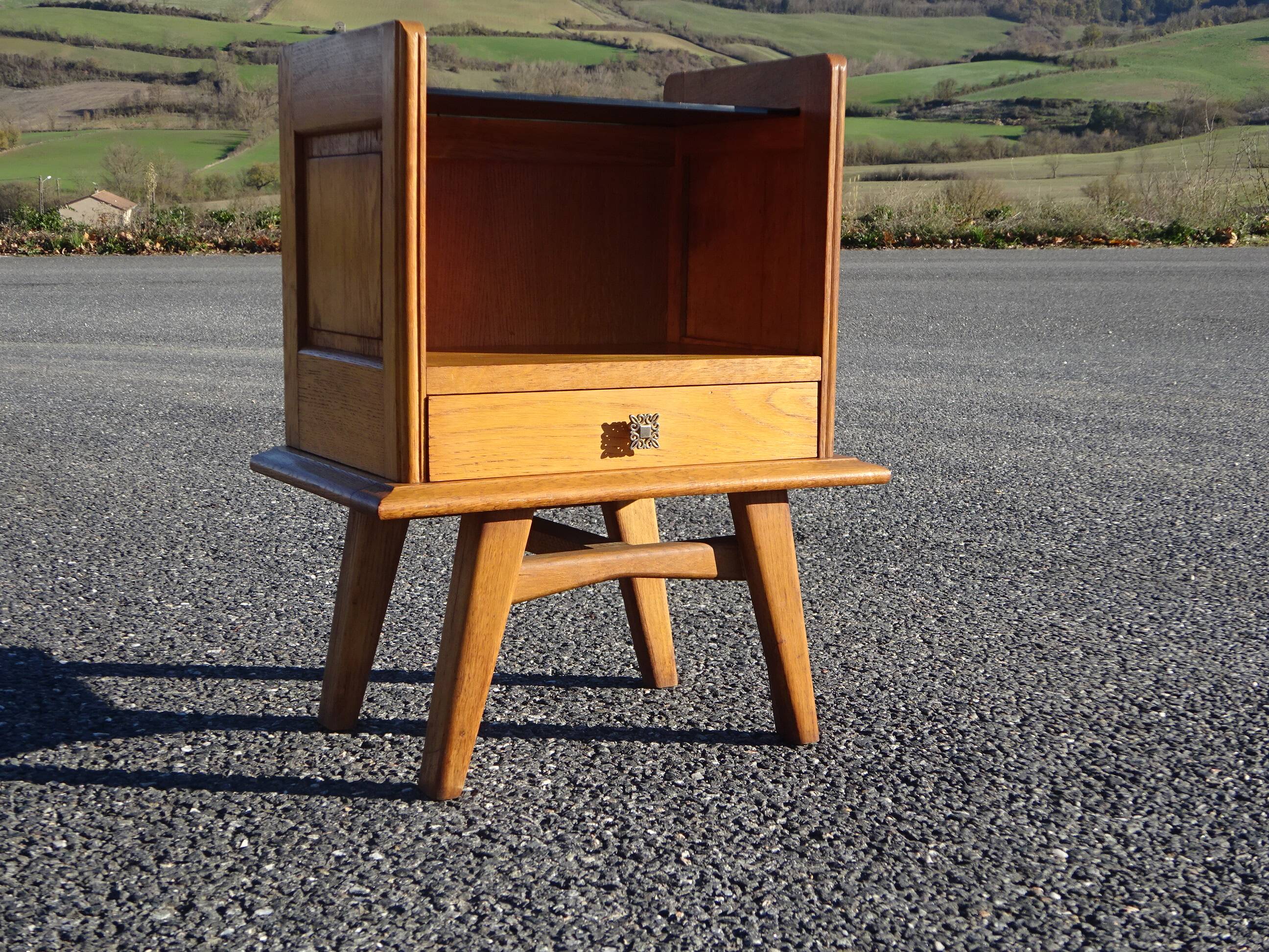 Oak bedside table with tapered legs