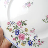 4 flat plates by Bernardaud, Limoges porcelain, floral decoration from the 1920s to 1950s.
