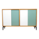 A vintage mid-century bookshelf/sideboard with green and white sliding door