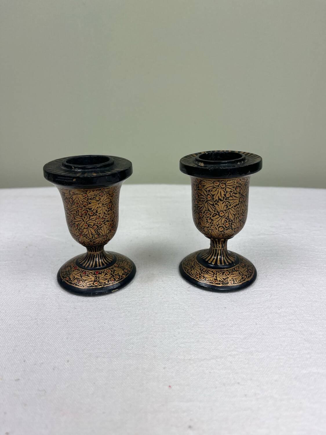 Pair of lacquered wooden candlesticks