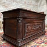 Chest in carved natural wood of the eighteenth century