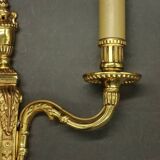 Pair of Louis XVI style urn and torch wall lights - gilt bronze