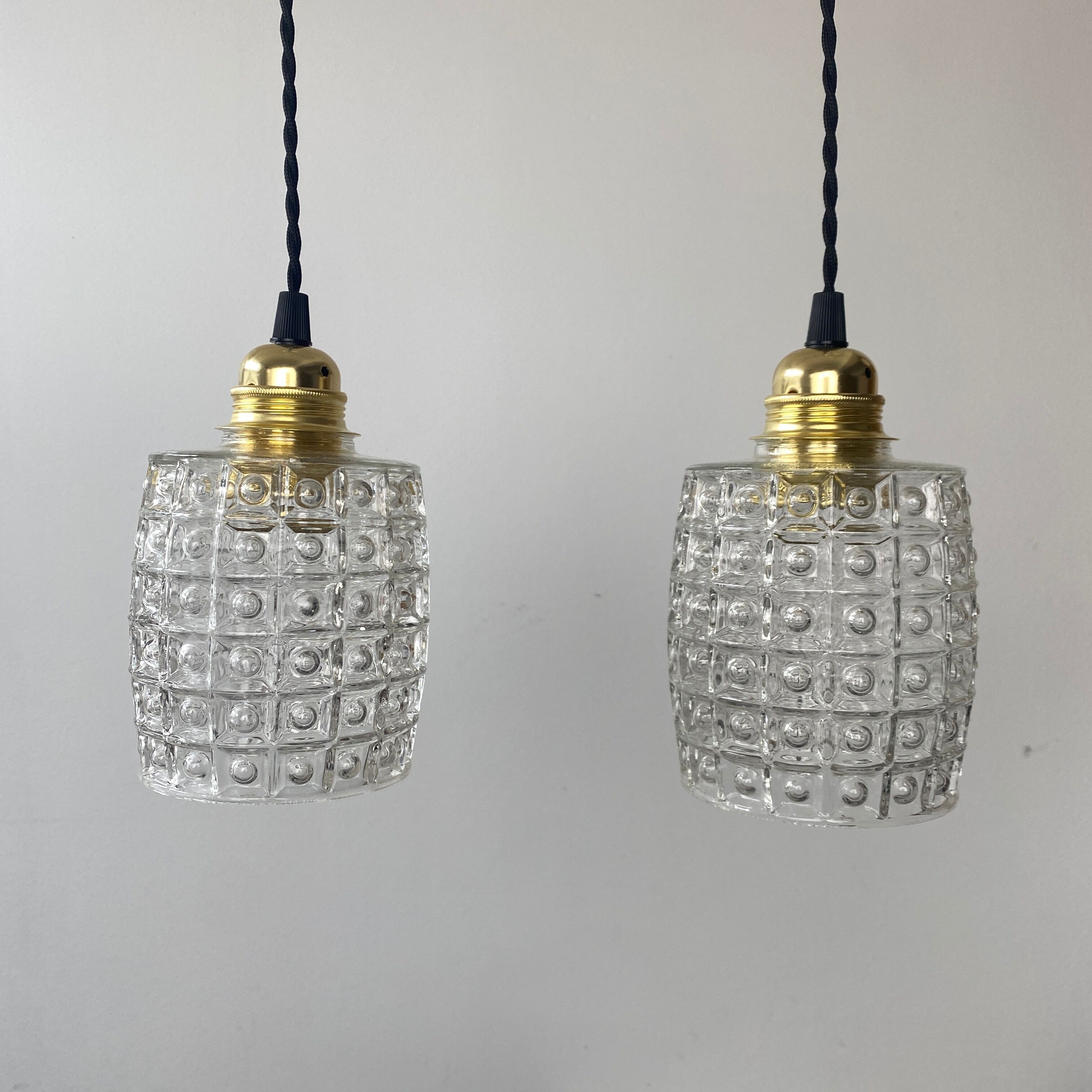 Pair of vintage molded glass pendant lamps
