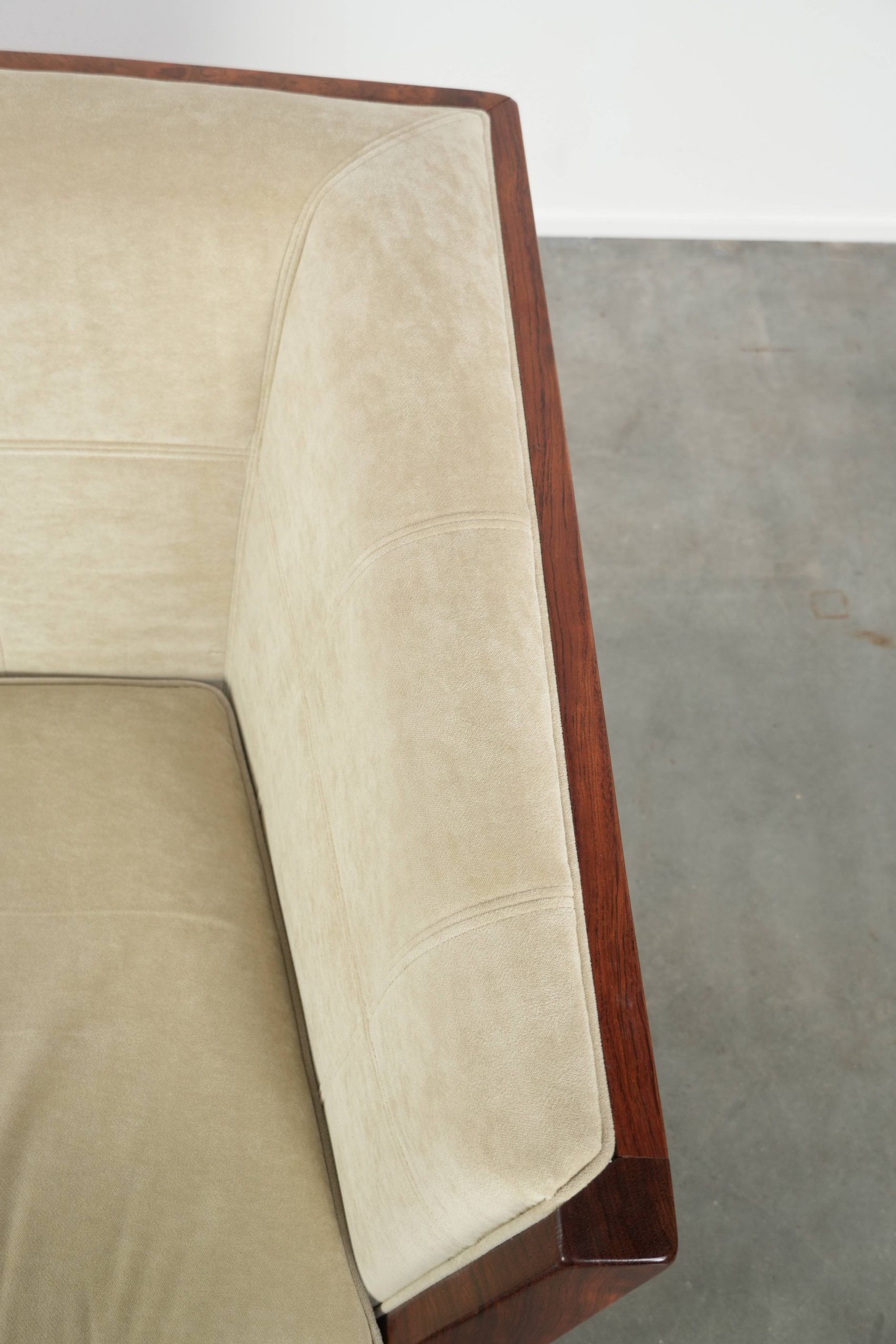 Art Deco design sofa with beautiful woodwork and cream fabric upholstery
