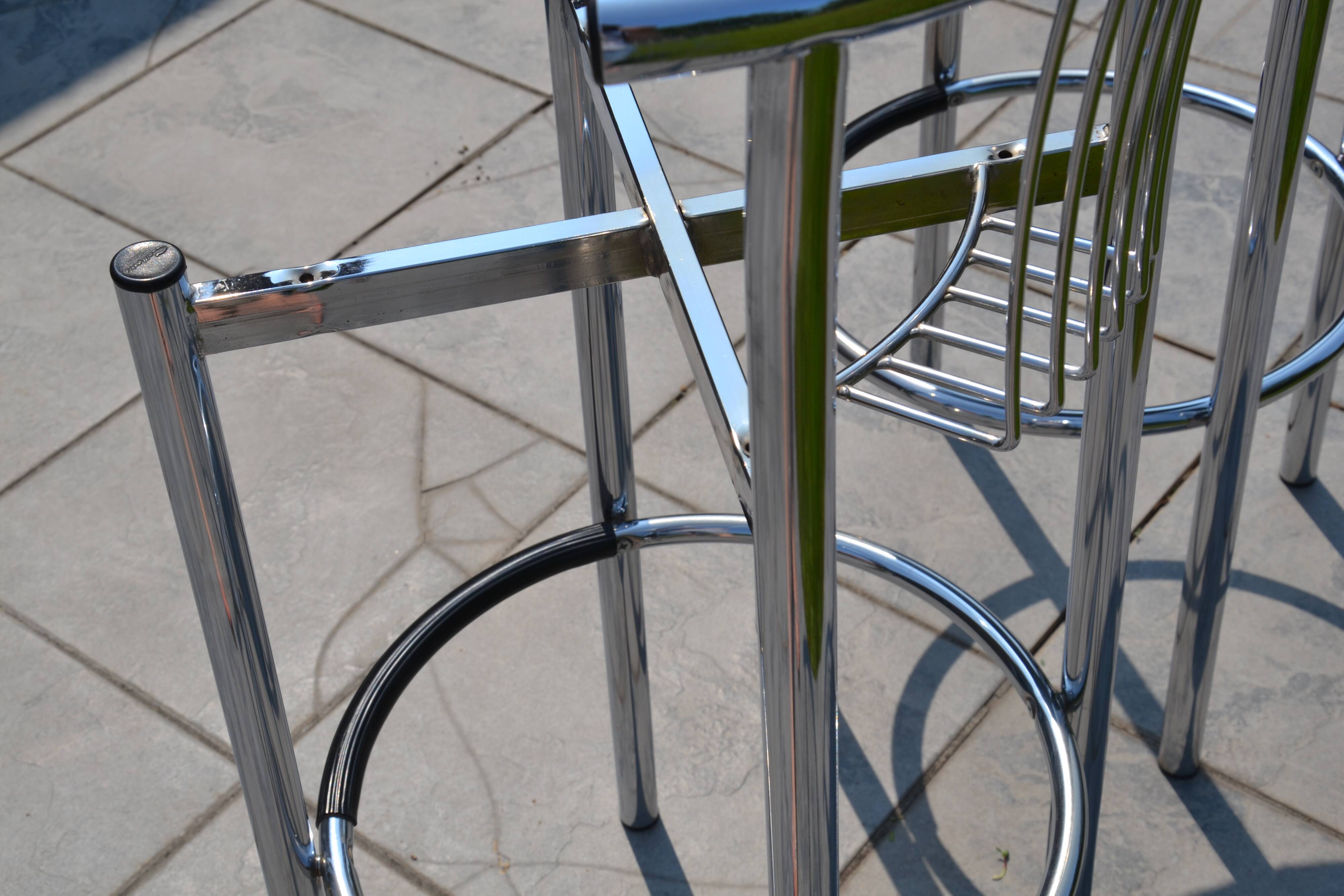 2 "Calligaris" bar stools with chrome metal and refurbished seats.