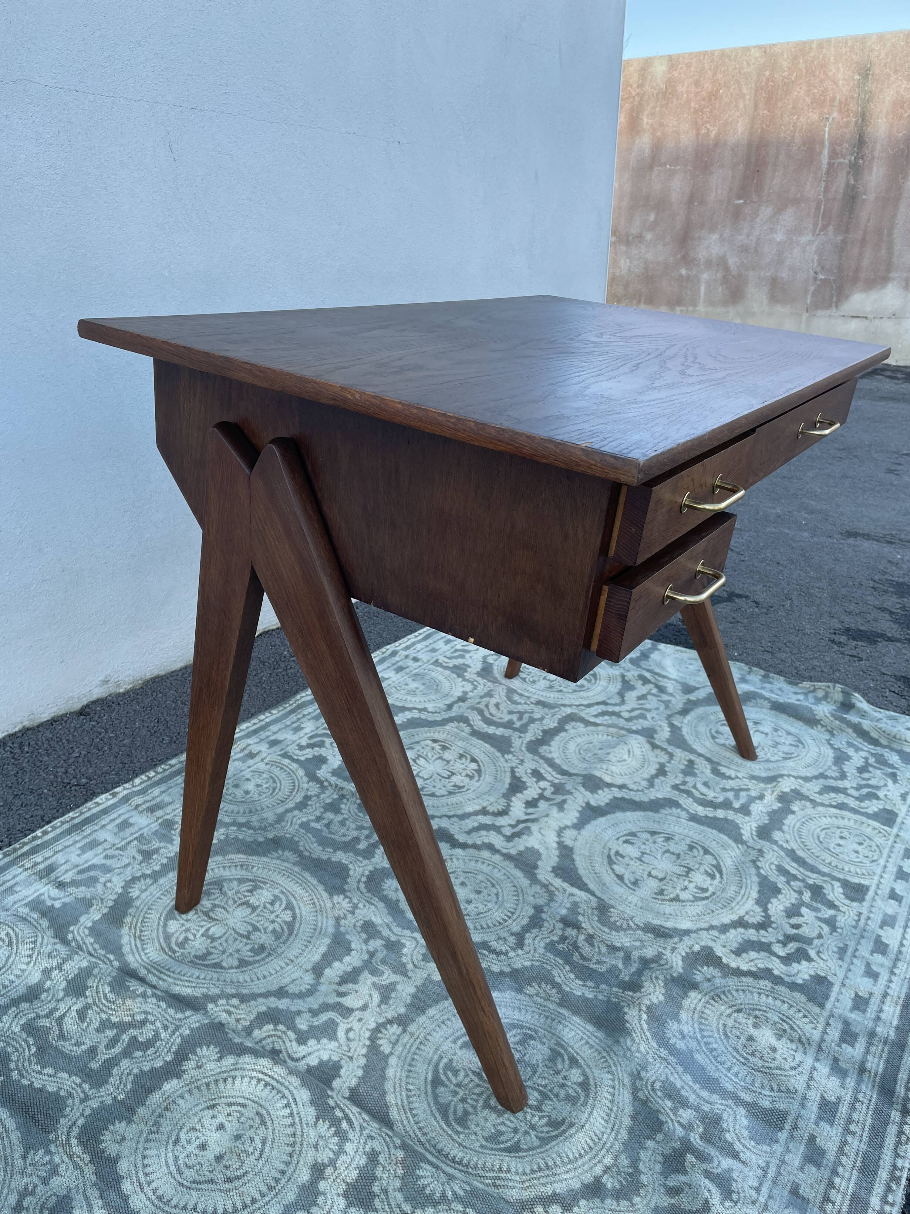 Modernist wooden desk with compass feet 1950
