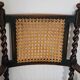 Paire de fauteuils canneés style Louis XIII anciens