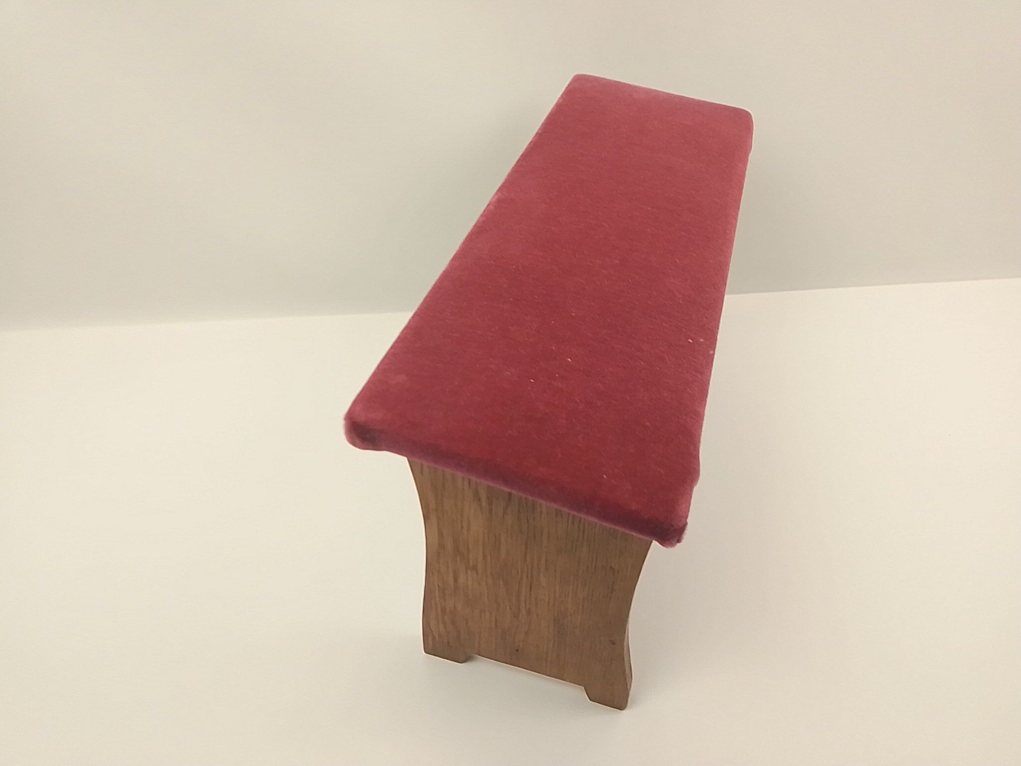Footrests in wood and pink velvet