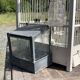 1950s wooden and metal birdcage with period accessories