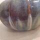Globe vase, narrow neck, wide body.
