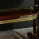 Table Rognon en Moucheté d’Acajou, estampillée “L’escalier de Cristal” – Fin XIXe
