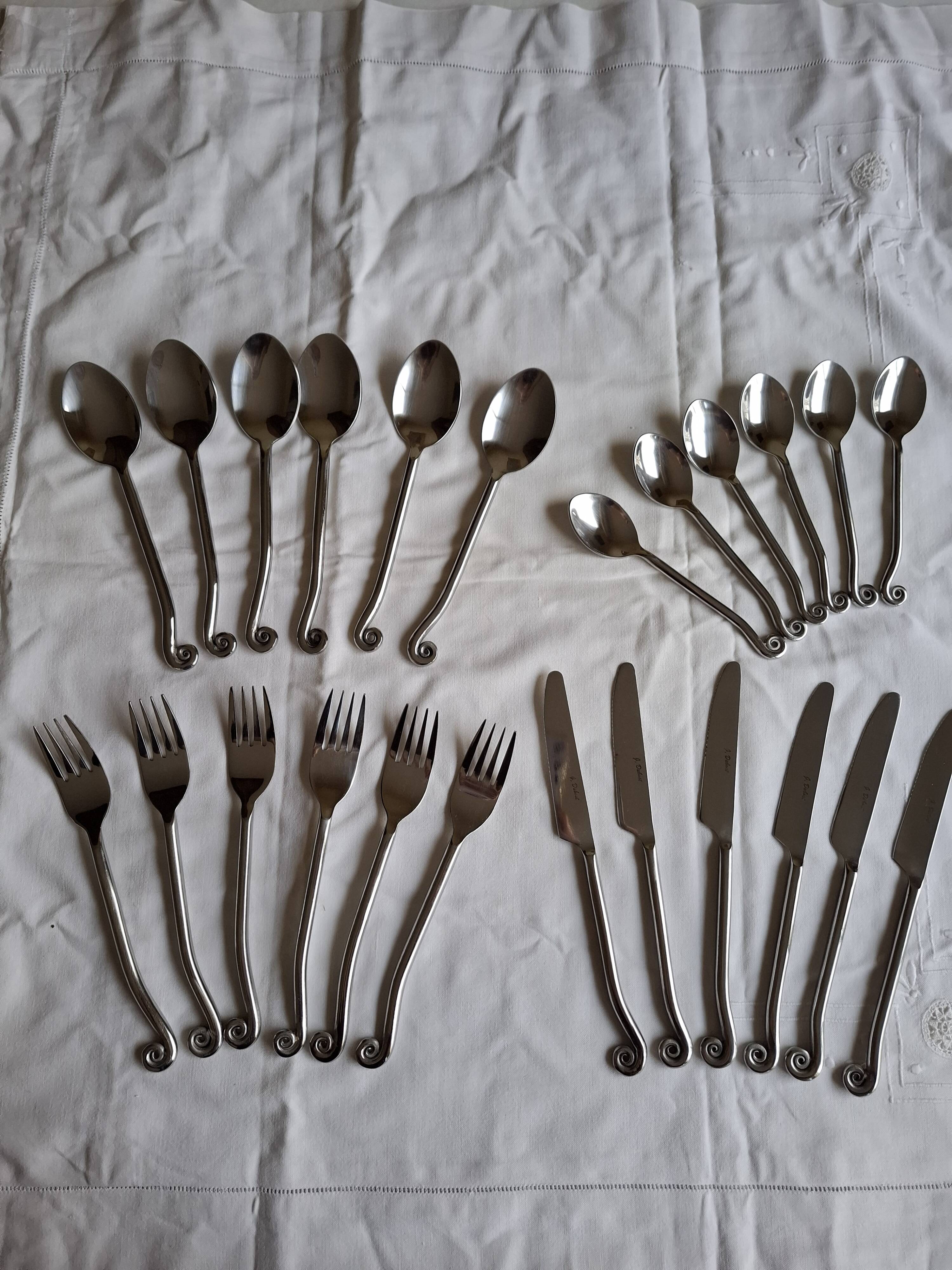 Twisted metal cutlery with a fancy spiral design.