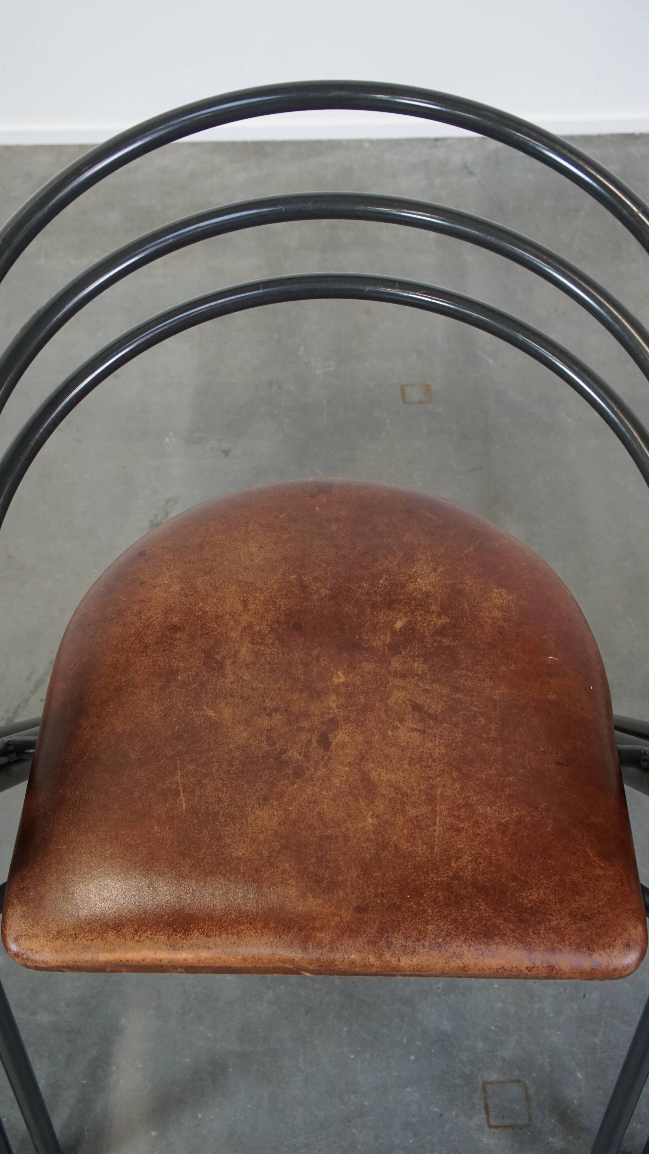 Set of 4 1970s design dining chairs with leather seats and metal frame