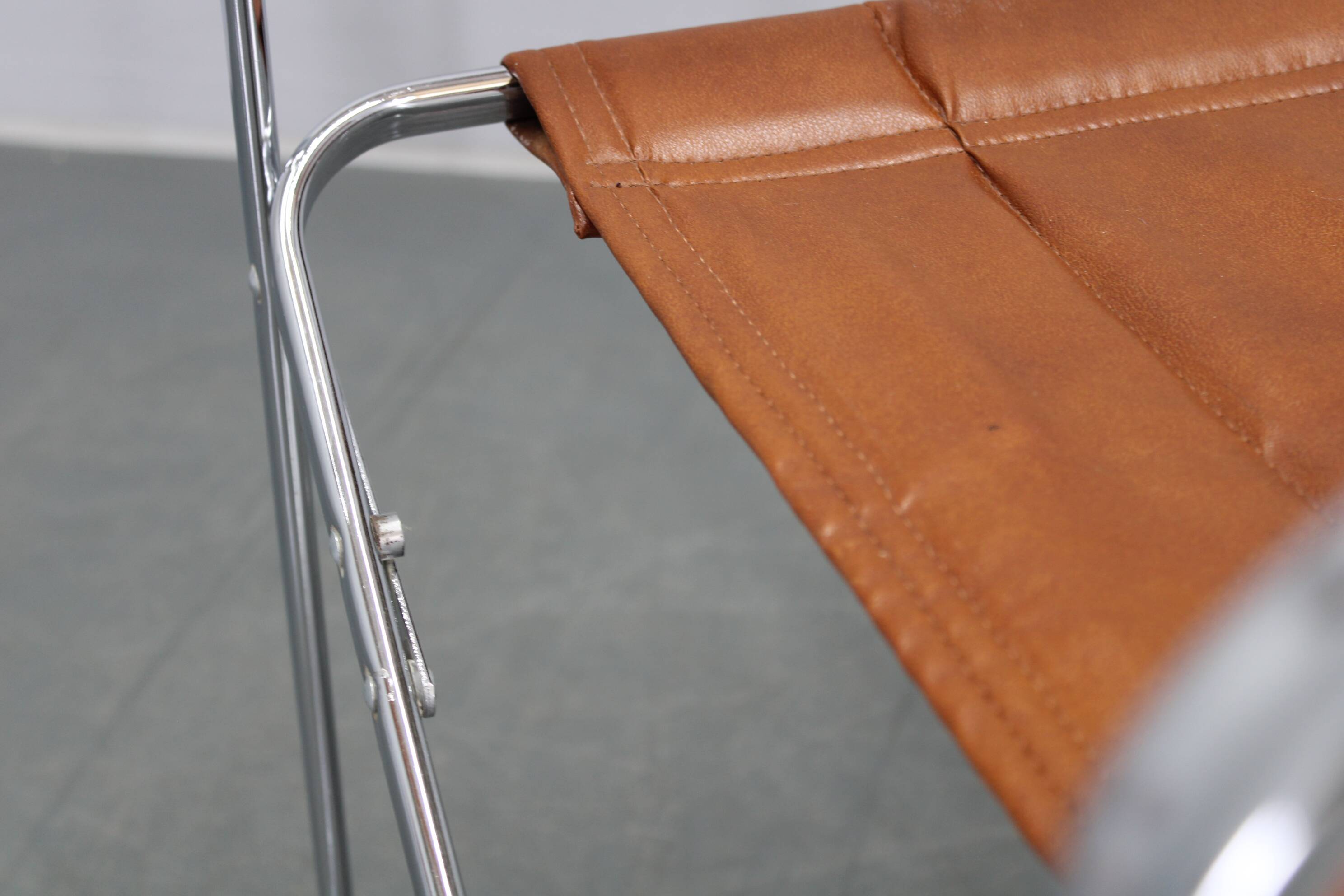 1970s pair of Italian folding chairs with leatherette upholstery