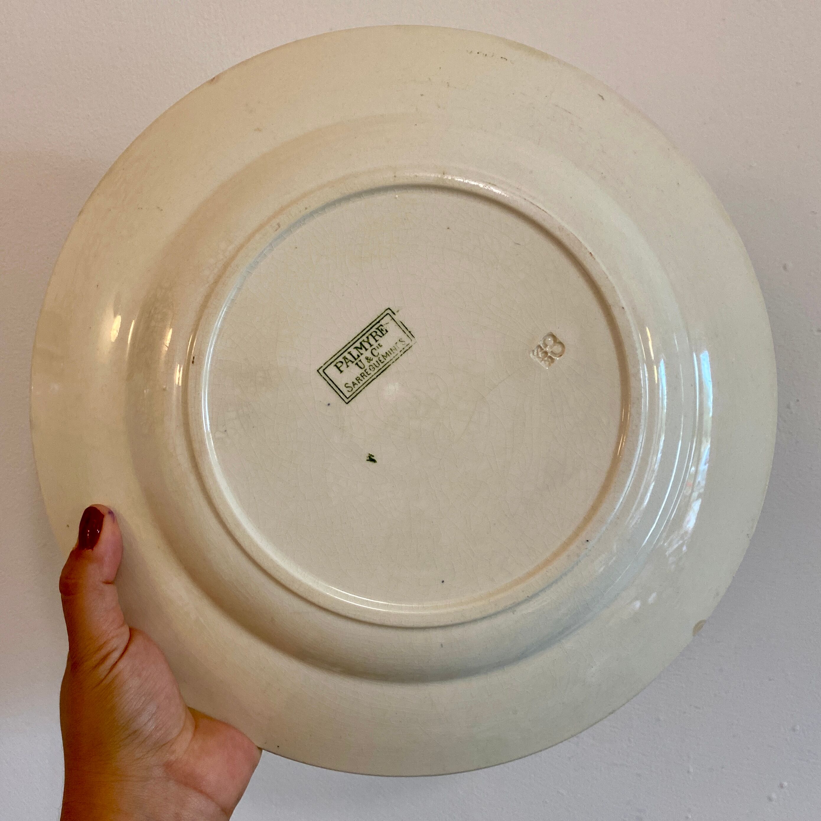 Round vinatge dish in iron earth model Palmyra of Sarreguemines