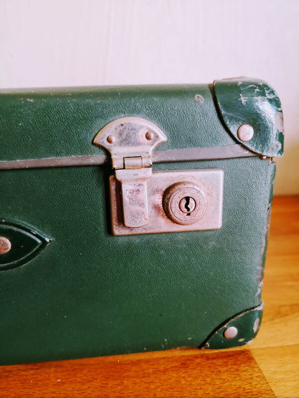 Small green suitcase