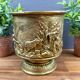 Cache-pot en laiton décor repoussé – XIXe-début XXe