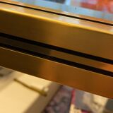 Lacquered brass, glass a two tier coffee table Pierre Vandel, circa 1970