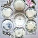 Antique deep plates in ironstone with a soup tureen.