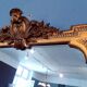 Large mirror XIX th in wood and gilded stucco Louis XVI style