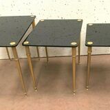 Pull out tables in brass and black glass XX century