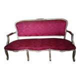 Louis XV style sofa in gilded wood and red pompadour fabric