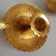 Pair of vintage oriental golden brass cellar candlesticks
