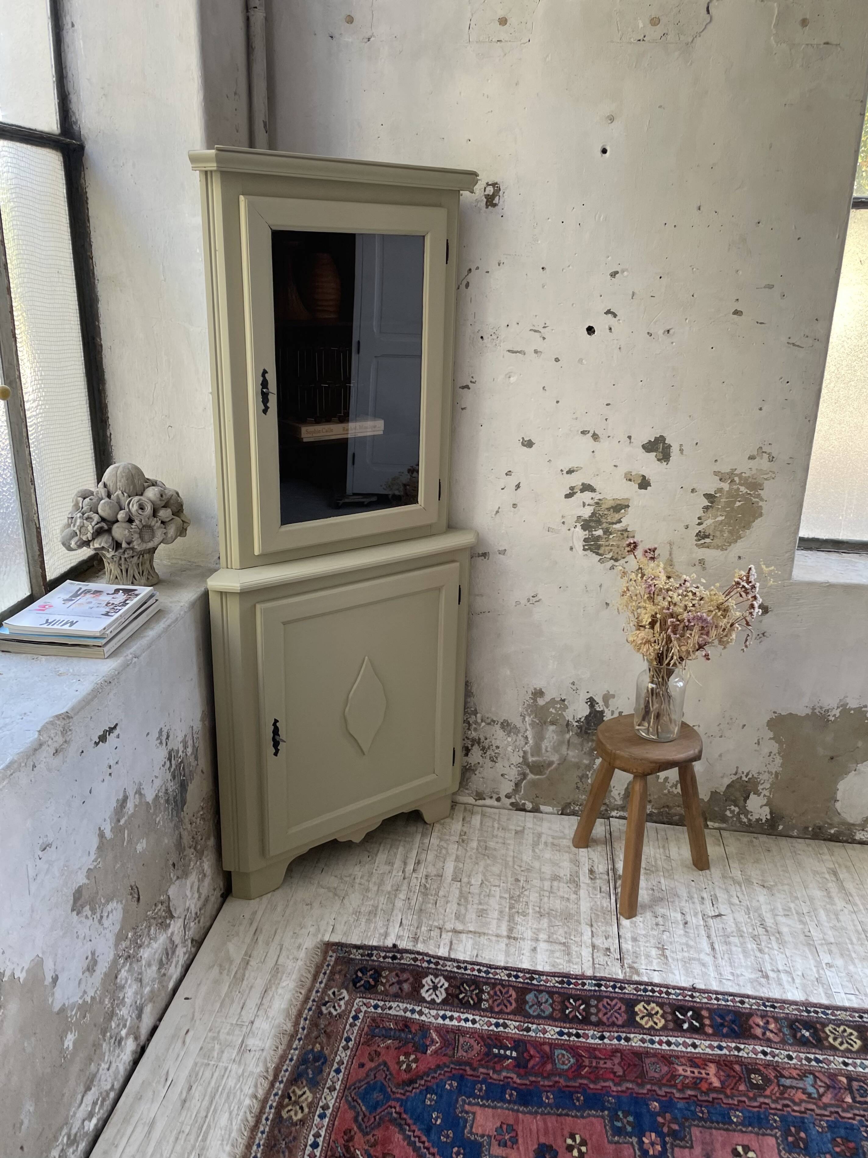 Corner display cabinet from the 1950s