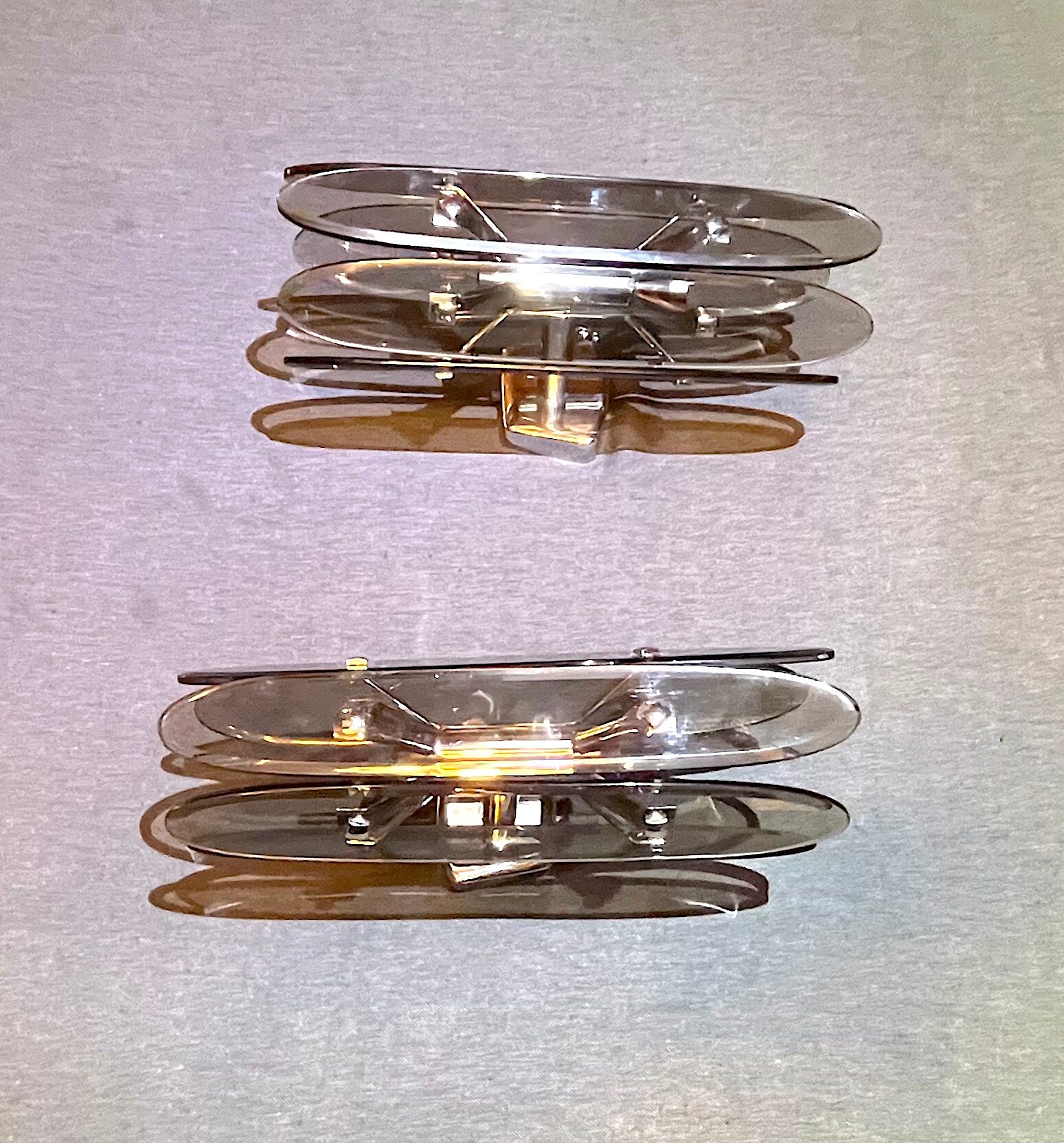 Pair of Italian wall lamp in glass and chrome, 1970's