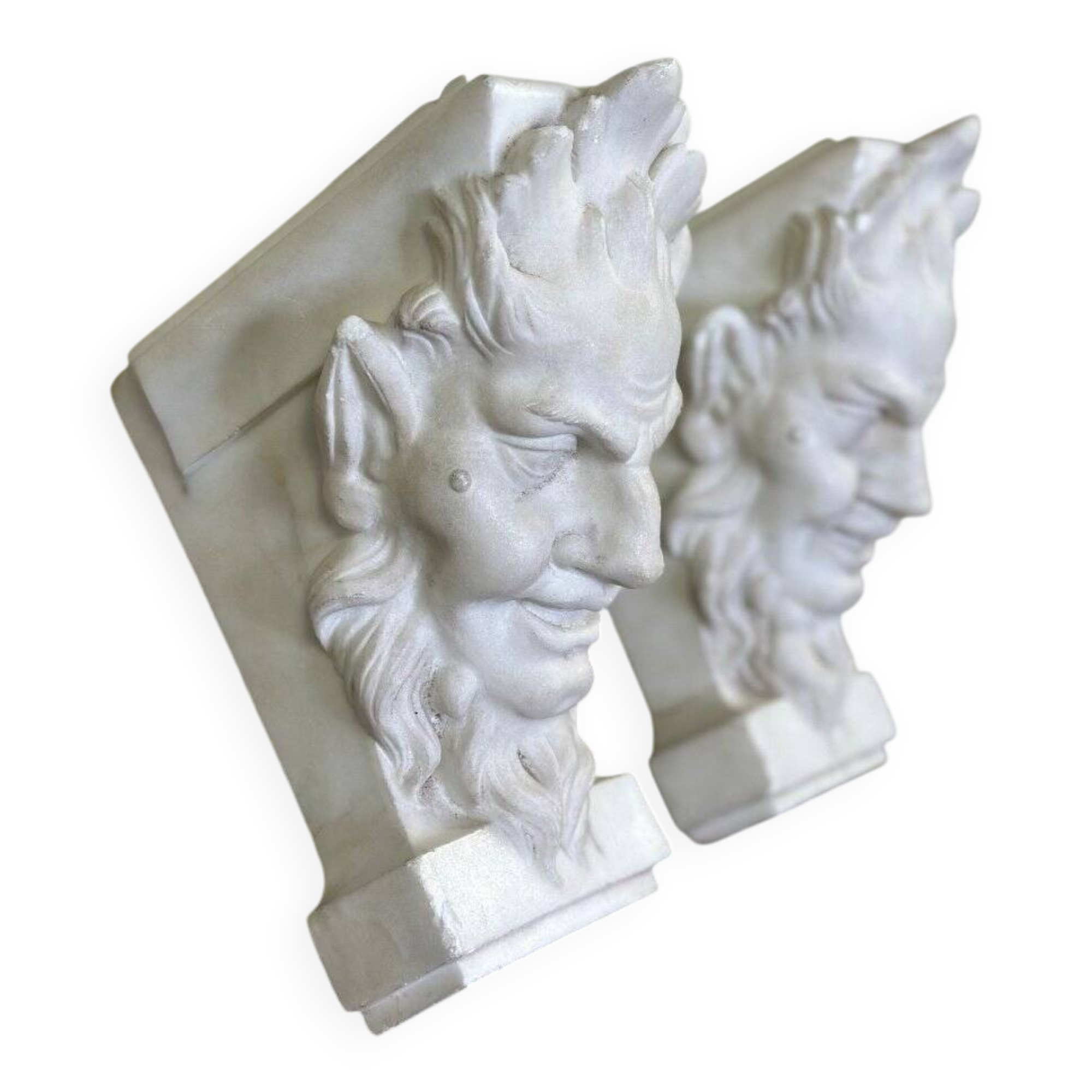 Pair of white statuary marble consoles, with faun heads
