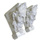 Pair of white statuary marble consoles, with faun heads