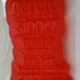 Thermoformed poster in red Color Gérard Singer