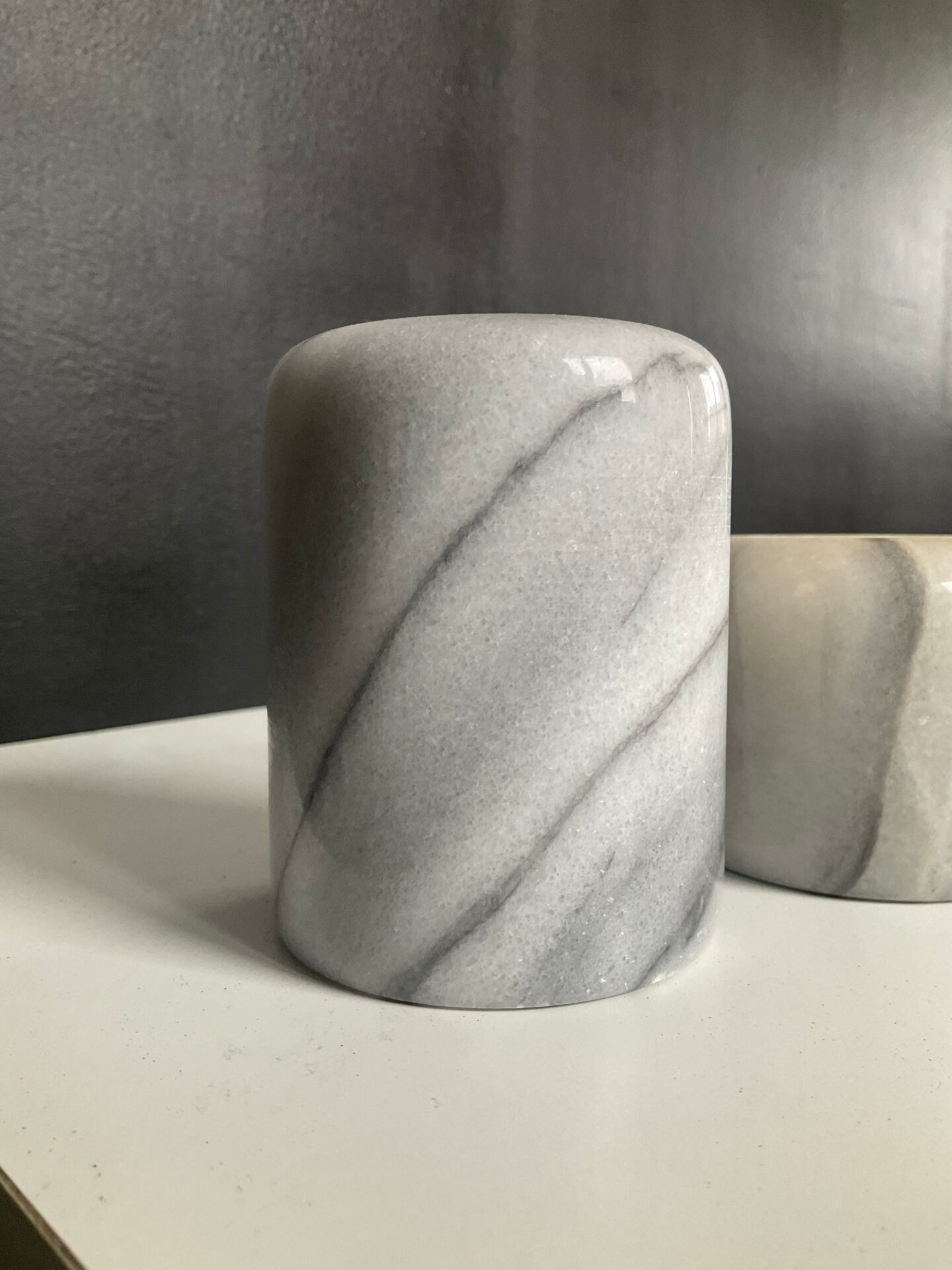 Set of 5 nesting candle holders in white marble.