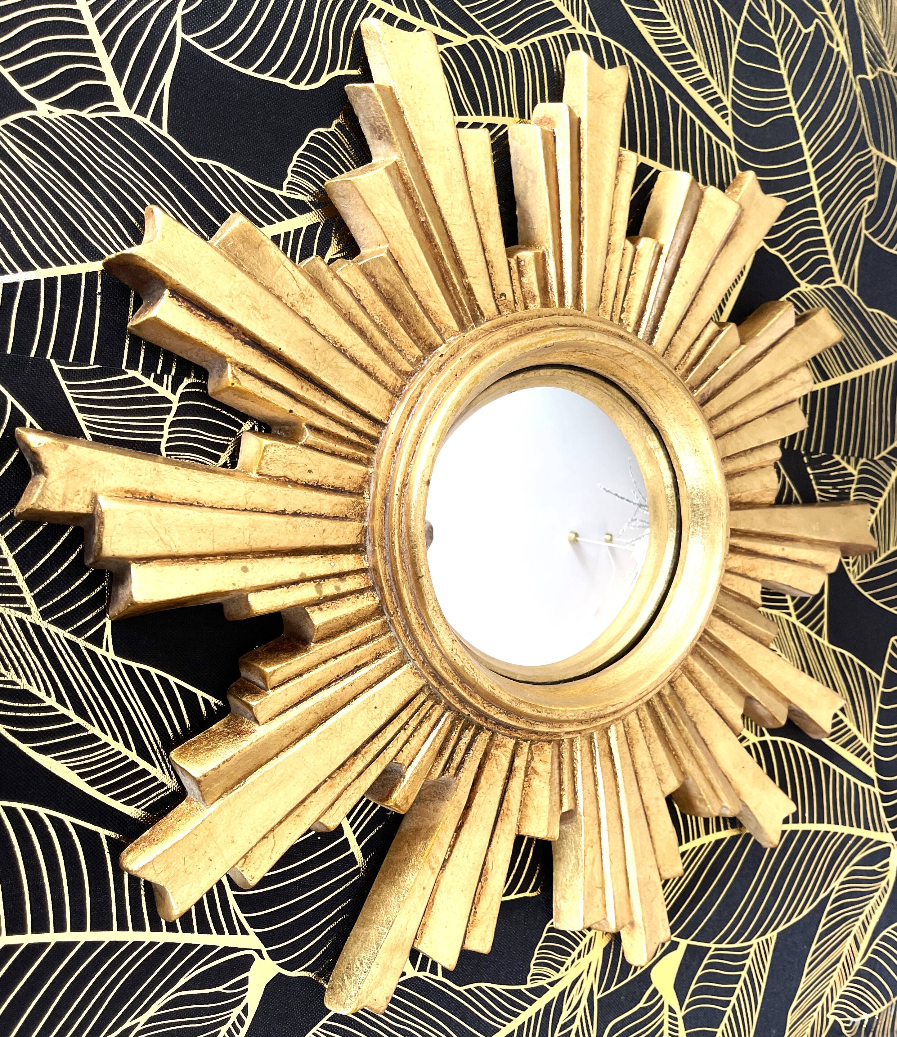 Golden wood “witch’s eye” sun mirror