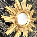 Golden wood “witch’s eye” sun mirror