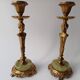 Pair of neoclassical candle holders in gilded bronze and green onyx, bust of