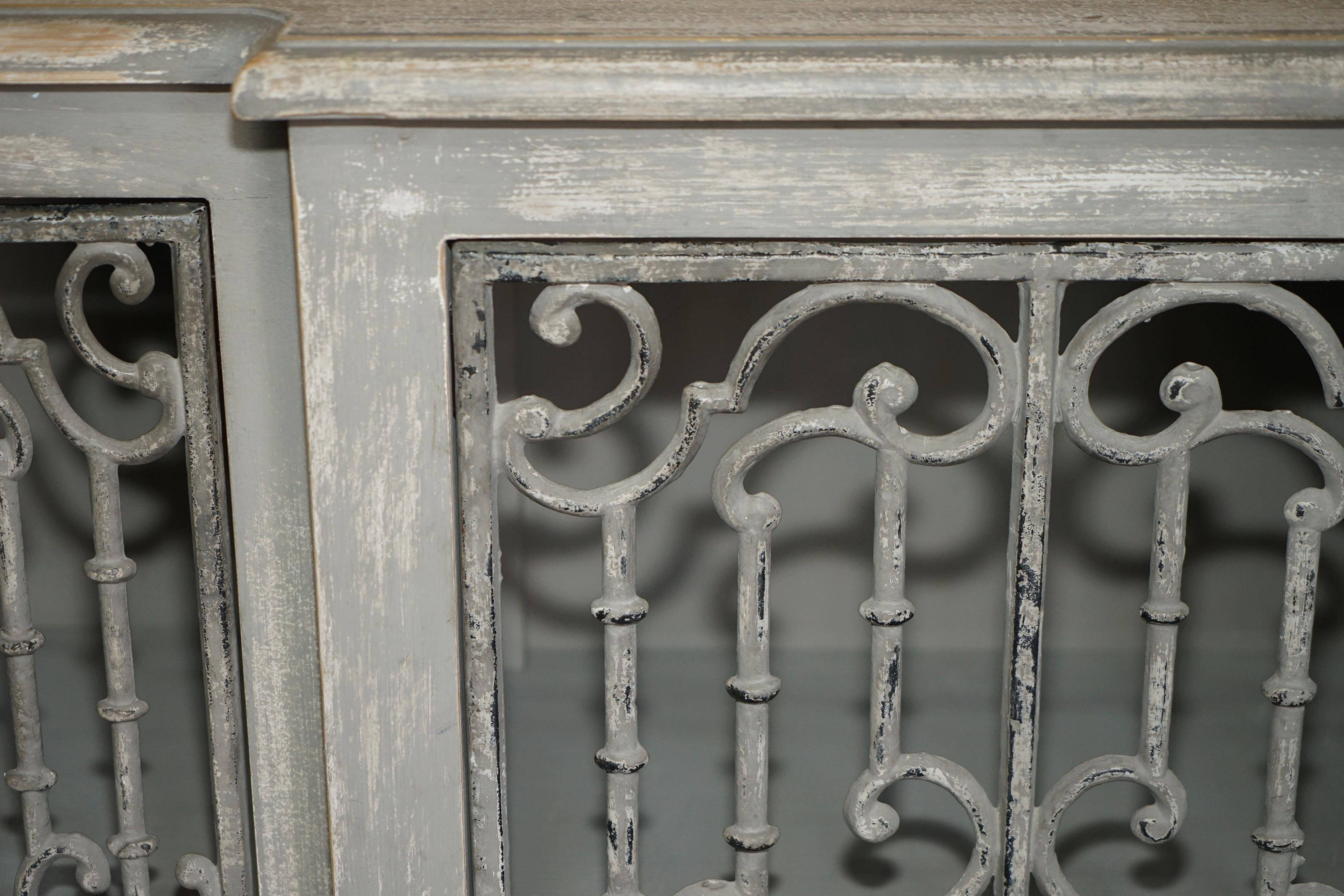 Vintage sideboard with wrought iron doors