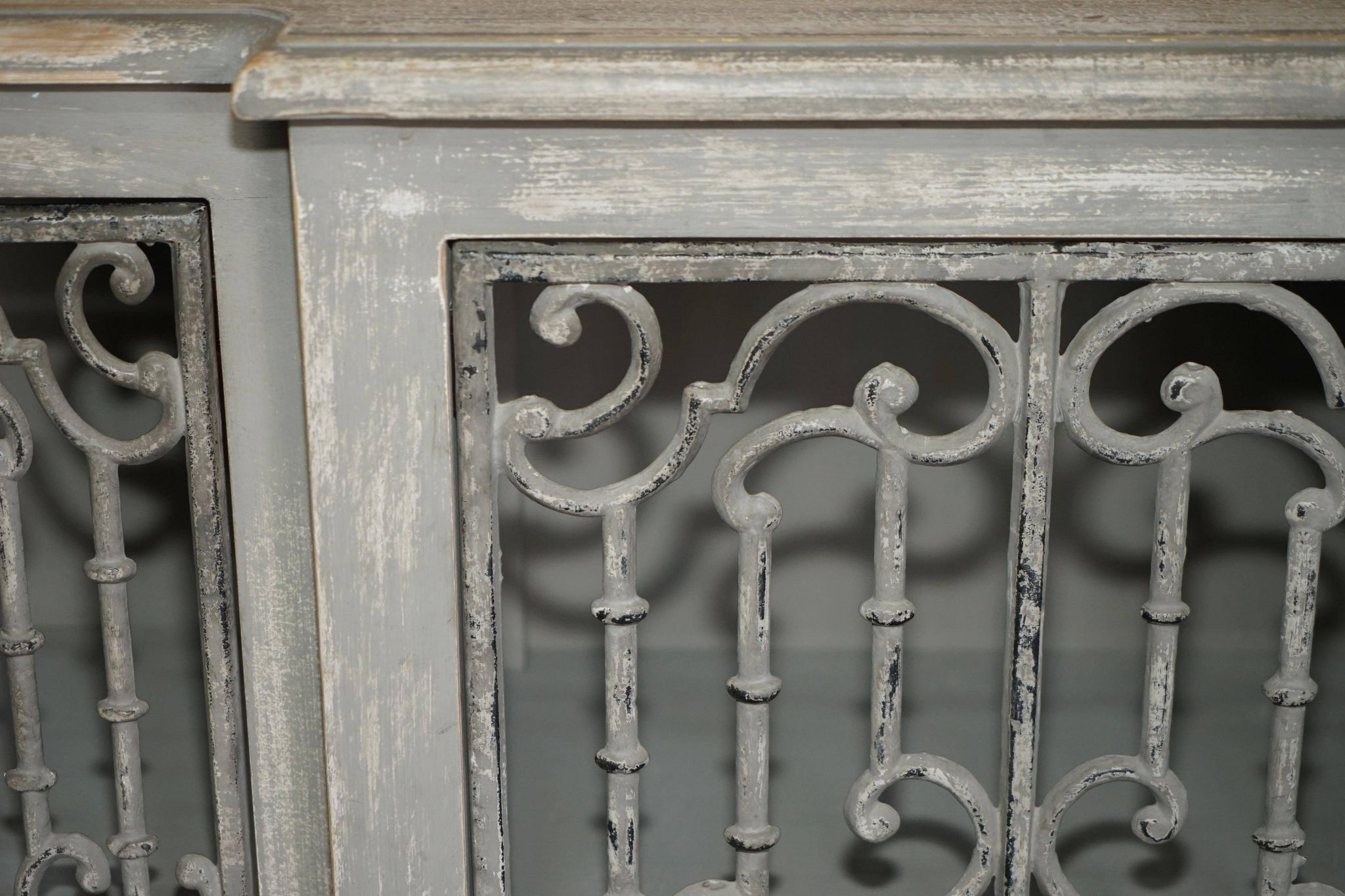 Vintage sideboard with wrought iron doors