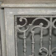 Vintage sideboard with wrought iron doors