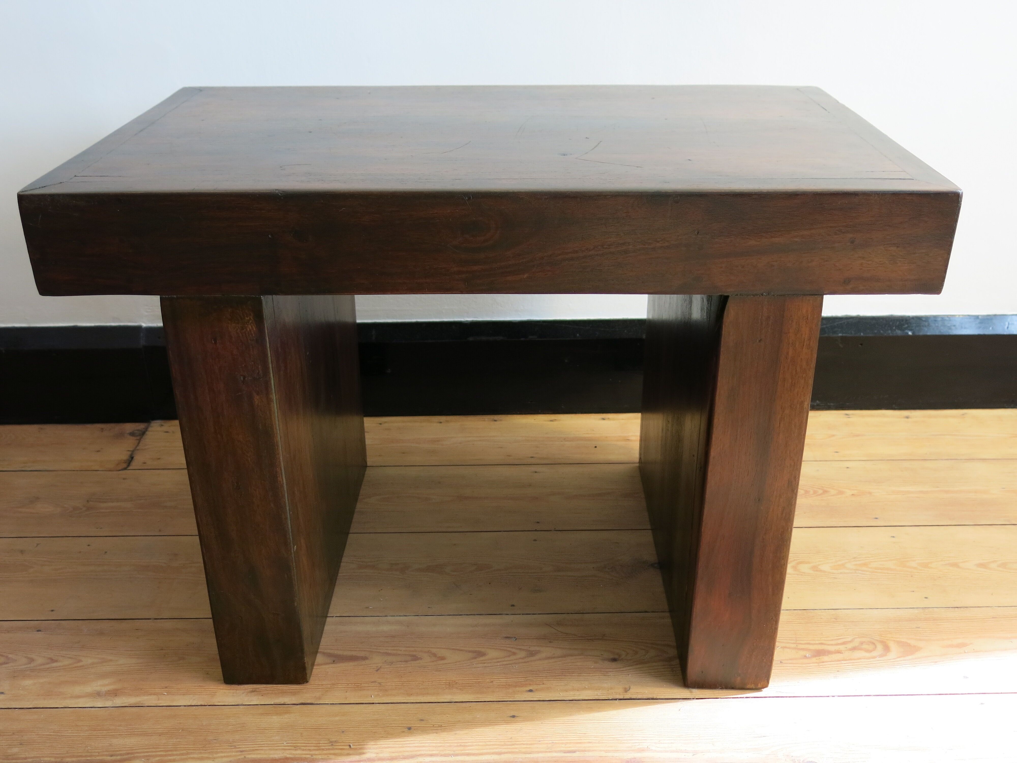 Solid bench made of tropical wood