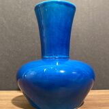 Signed vase in turquoise blue earthenware