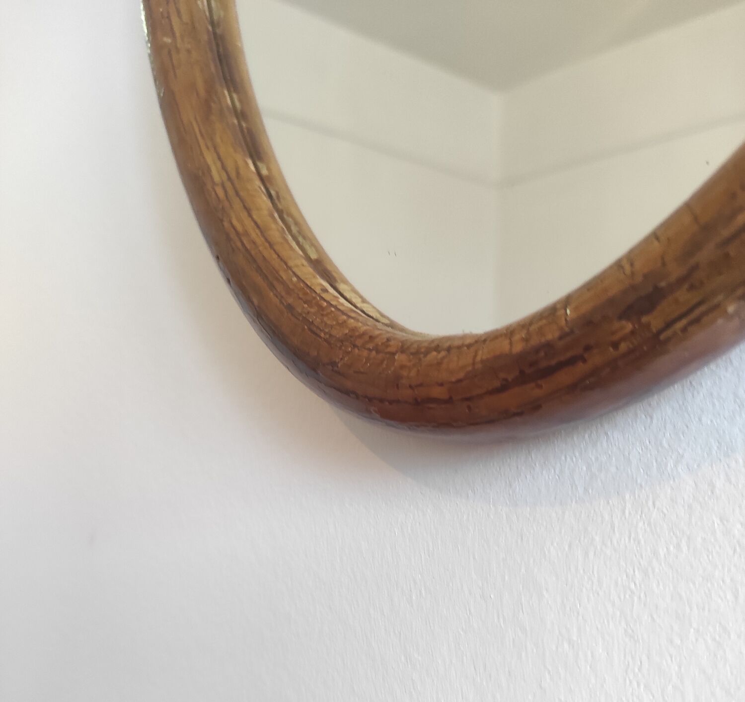 Vintage oval rattan mirror