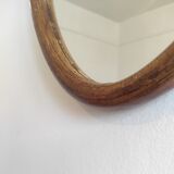 Vintage oval rattan mirror