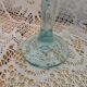 Glass tulip candle holder on stand