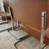 Suite of 4 skai and chrome armchairs 70