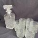 Chiseled glass whiskey service carafe and 6 Italian glasses