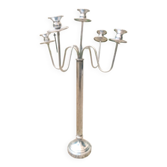 Standing candlestick in stainless steel metal with 5 movable branches, with smooth ring for 4 cm candles.