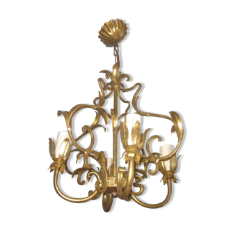 Antique chandelier in gilded metal