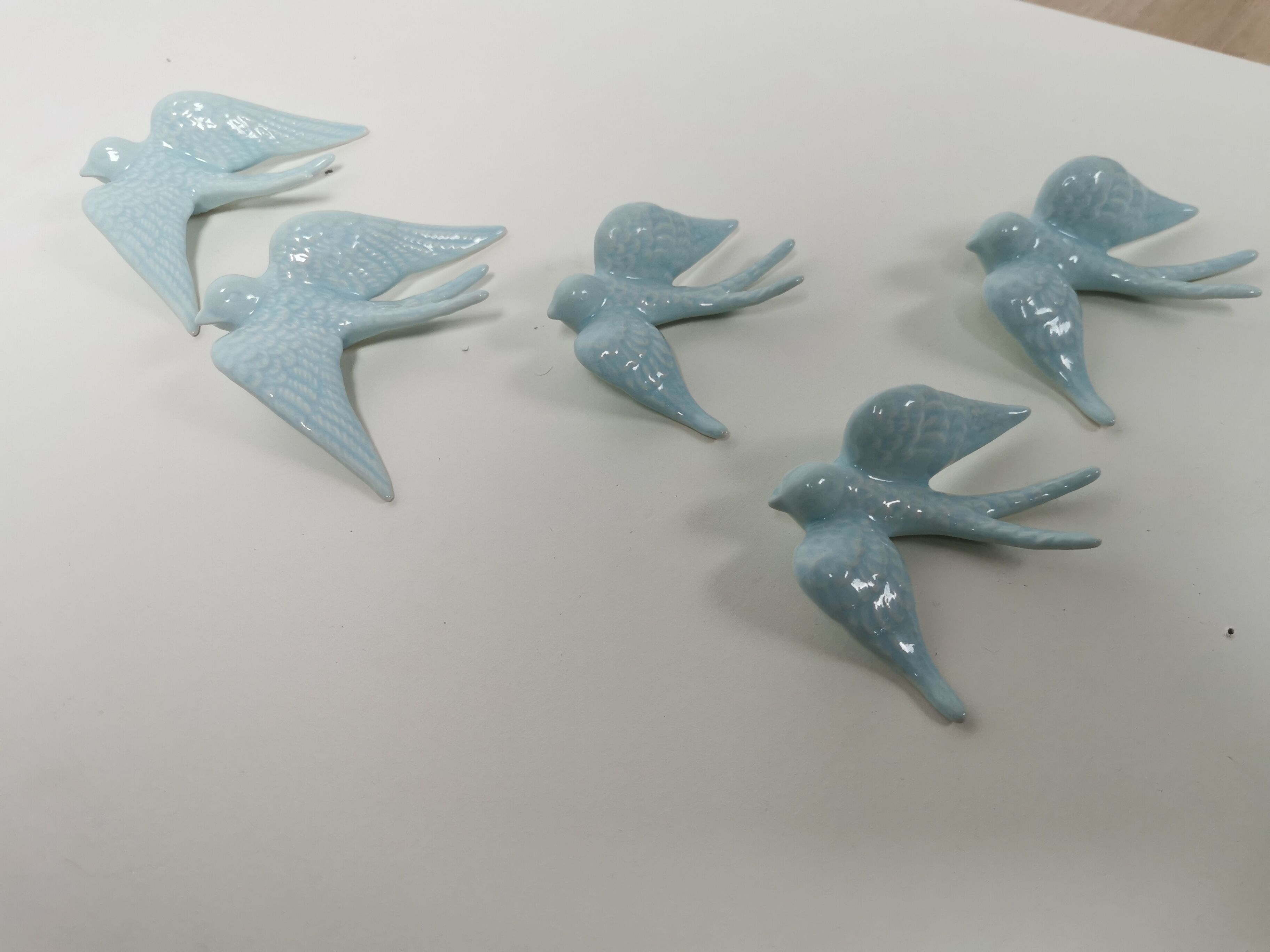 Batch of swallows in ceramic
