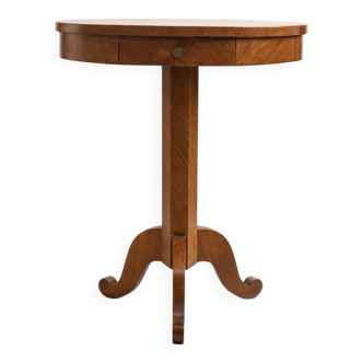 Round wooden side table